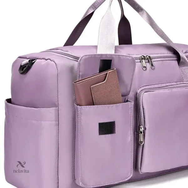 Sac violet avec bandoulière ajustable, idéal pour le sport