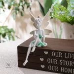 Sculpture de jardin fée assise élégante pour espaces verts