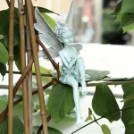 Statue décorative fée assise pour embellir votre jardin