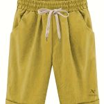 Look sportif avec short taille haute et poches