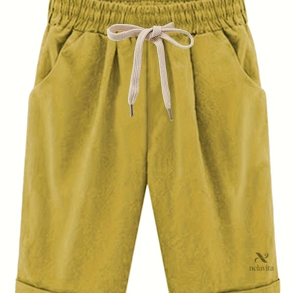 Look sportif avec short taille haute et poches