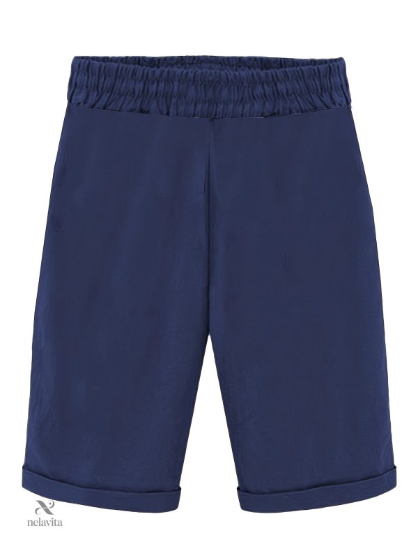 Bas de sport extensibles avec poches pratiques