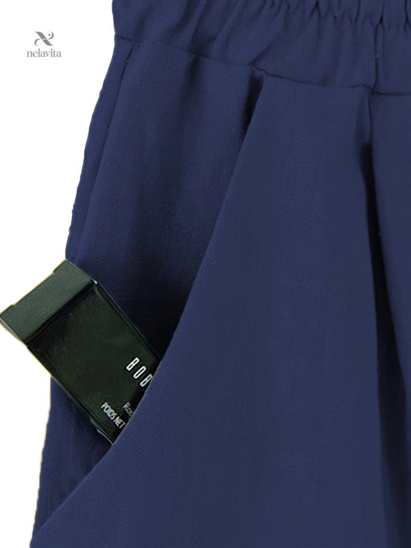 Pantalon court taille haute avec tissu élastique