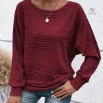 Pull uni avec silhouette ample, facile à associer