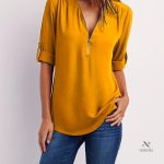 Top femme à manches retroussables pour l'été