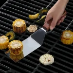 Outil de barbecue pour grillades, design ergonomique