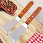 Spatule de plancha en acier inoxydable, manche en bois