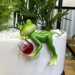 Statuette de jardin avec grenouille et vin