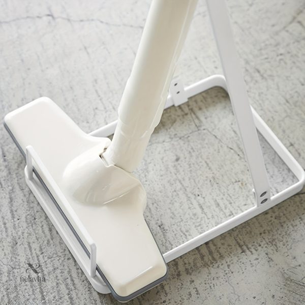 Accessoire de rangement pour aspirateurs balais modernes