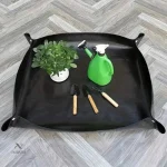 Accessoire de jardinage pliable pour rempotage sans désordre