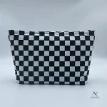 Accessoire de voyage résistant à l'eau avec motifs damier
