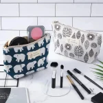 Trousse de toilette imprimée pour maquillage et accessoires